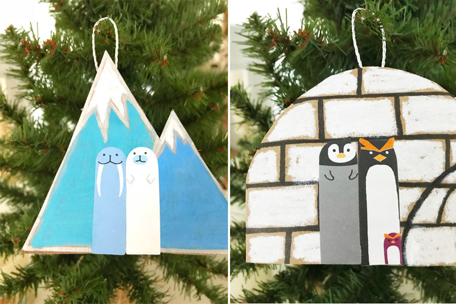 Completed DIY Christmas paper ornaments hanging from a Christmas tree