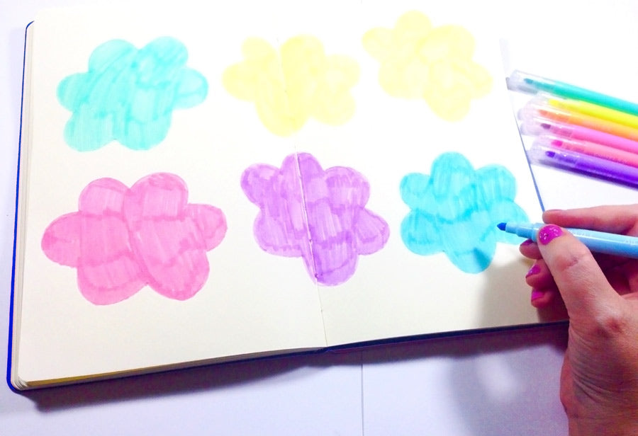 Coloring clouds in a DIY journal with OOLY Pastel Liners markers