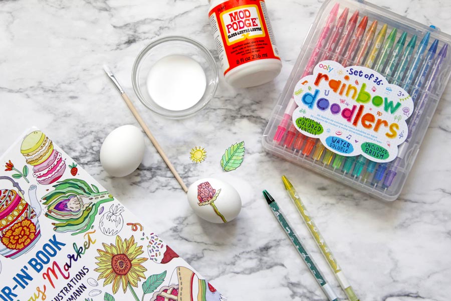 Decoupage decorating on Easter eggs with OOLY coloring book