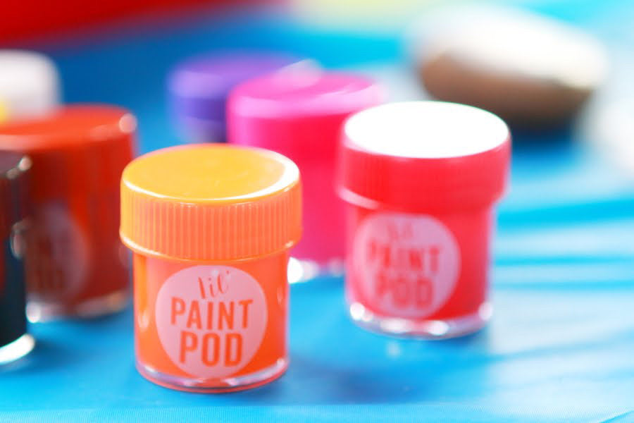 Orange, red and pink lil Paint Pods from OOLY