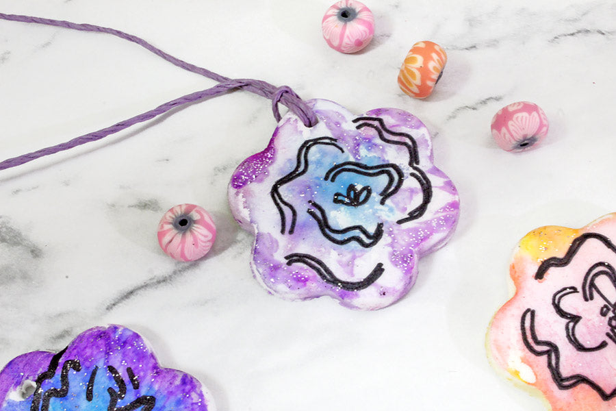 Purple DIY clay necklace with colored beads