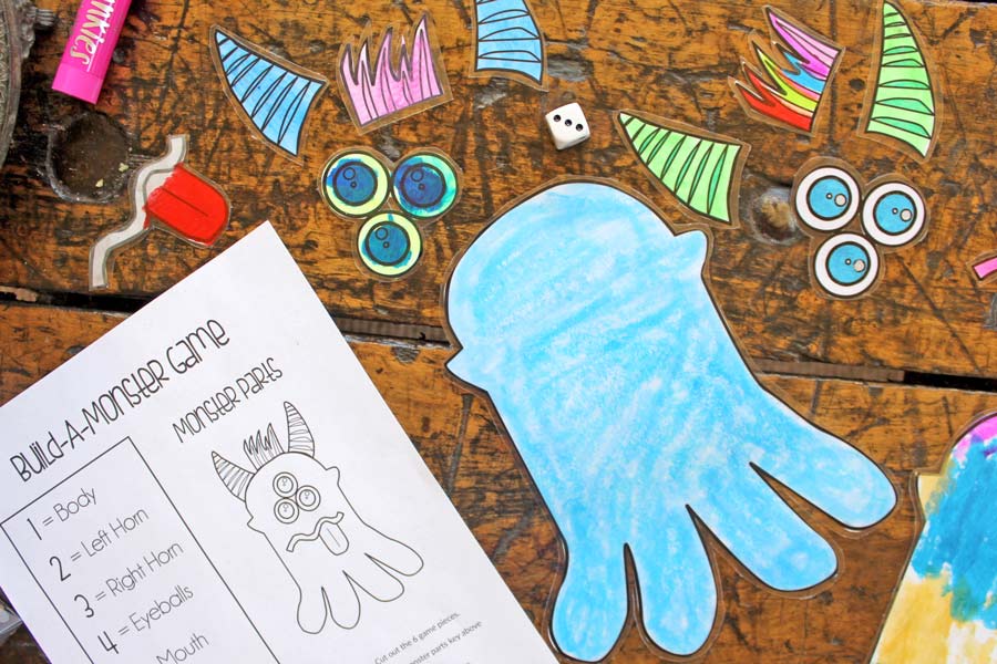 Build-A-Monster coloring game with monster colored peices