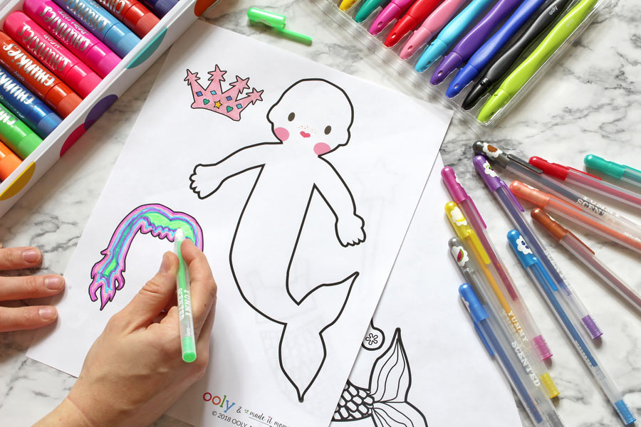 Girl coloring mermaid from coloring printable with Yummy Yummy Glitter Gel Pens