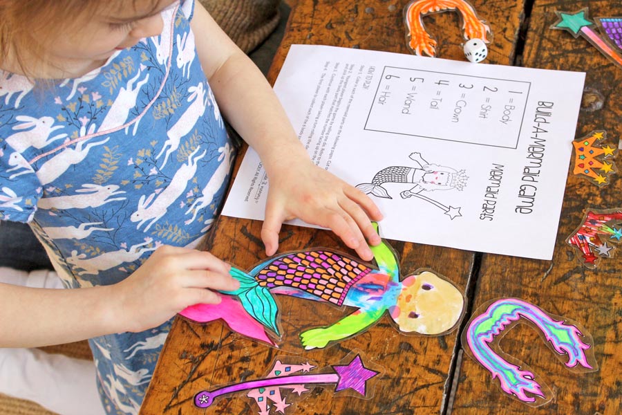 Piecing together colored mermaid from Build-A-Mermaid coloring game
