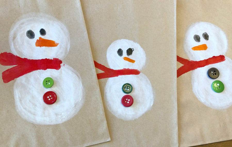 Decorate your holiday advent calendar bags with embellishments like buttons. 