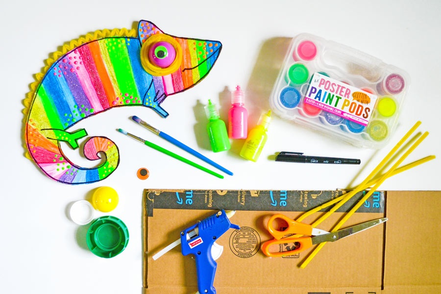 Colorful chameleon craft with paints, cardboard and other crafting materials