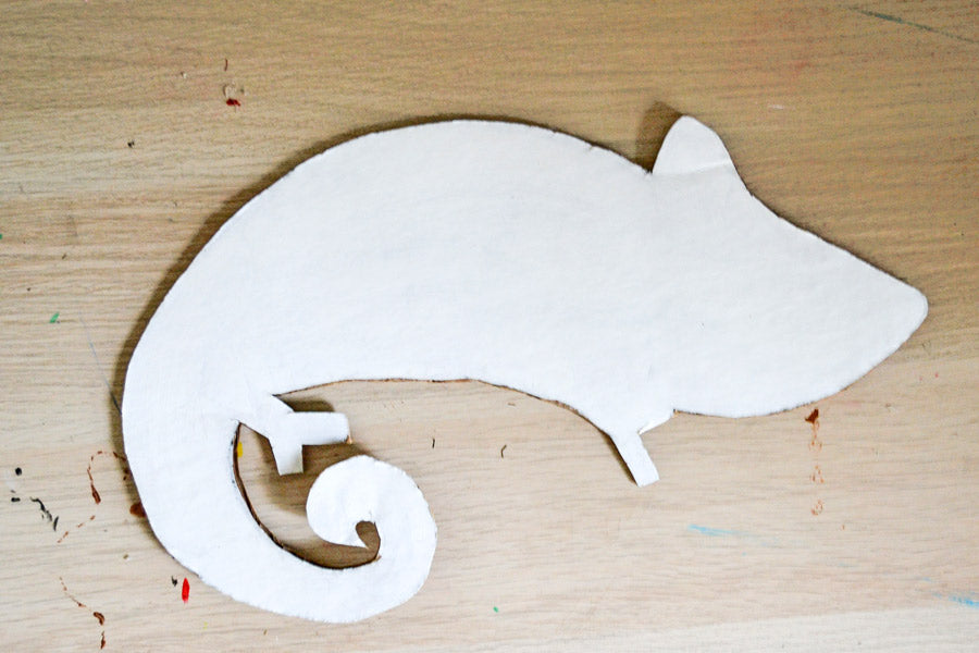 blank canvas of cardboard cutout of chameleon printable craft