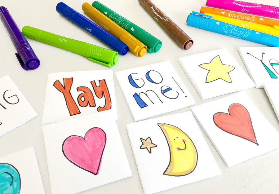 Chore cards made with OOLY markers for a DIY chore chart for kids