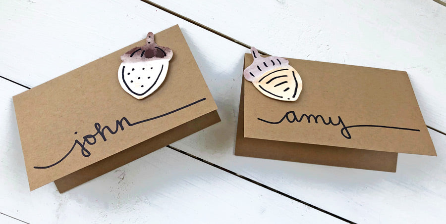 party place cards with watercolor acorns