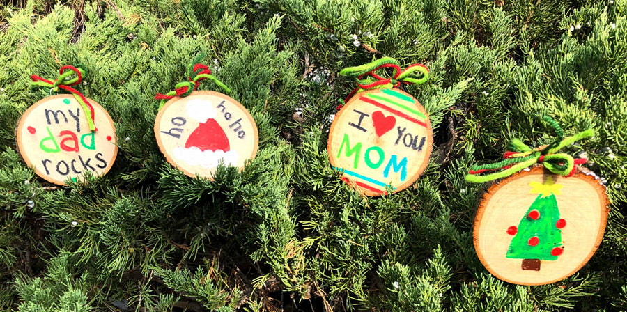 Festive DIY holiday ornaments in a tree 