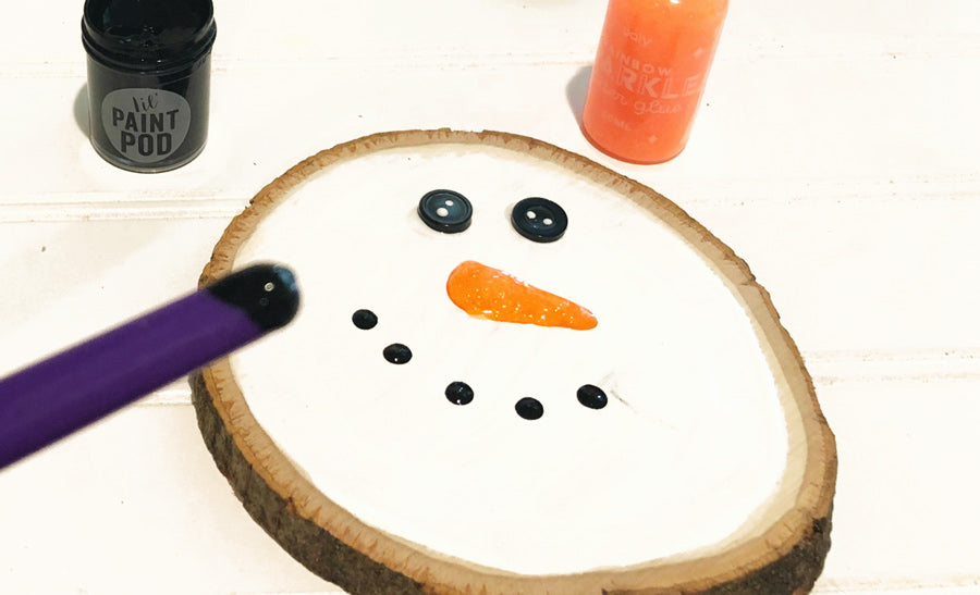 painted face on snowman festive DIY holiday ornament