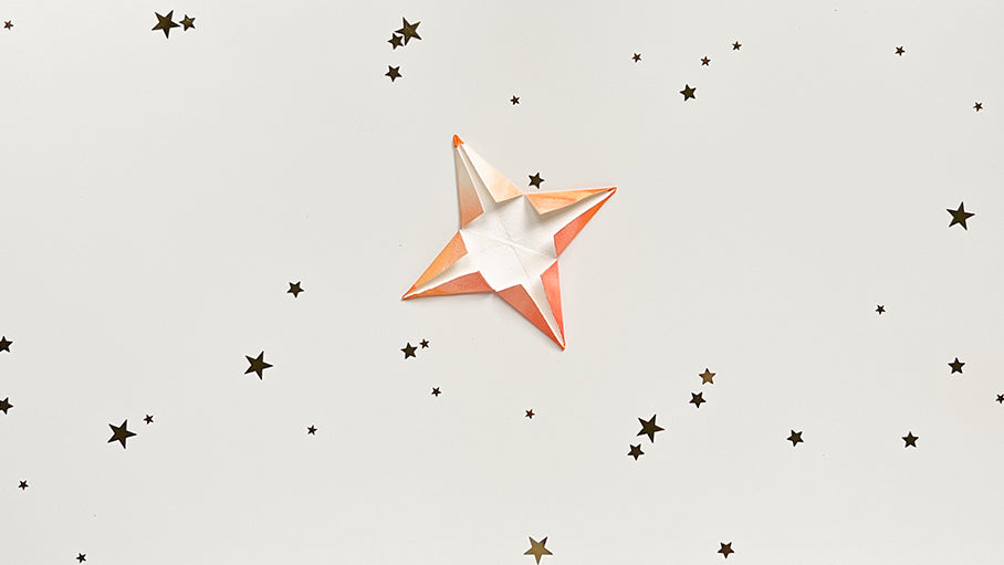 Colorful paper folder in the shape of a star
