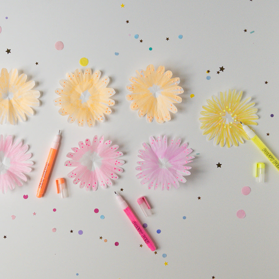 Colorful flowers with puffy paint dots on the inside and outside of the petals